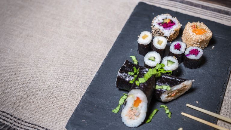 Sushi on slate serving platter