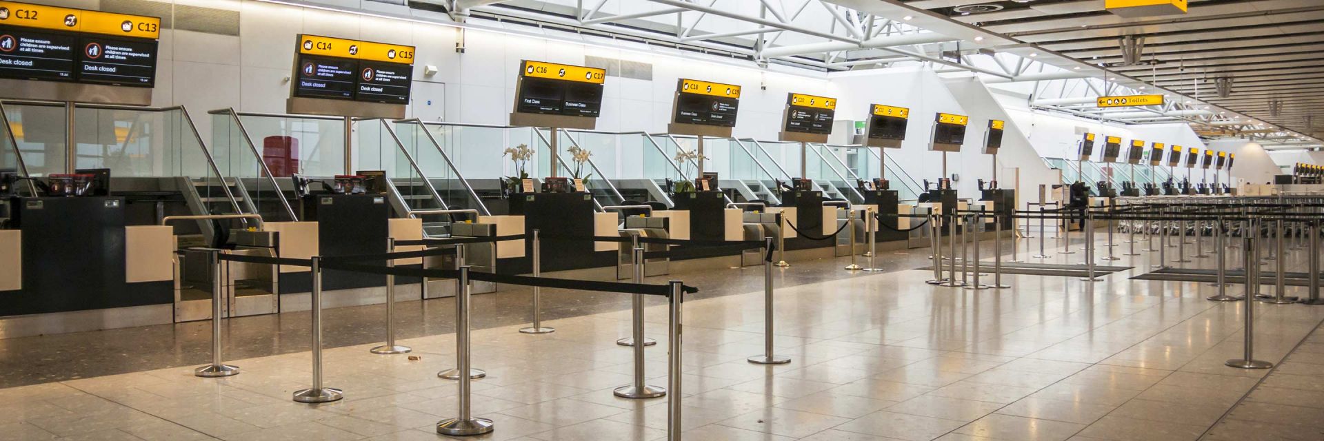 Empty airport with a view of the check in desks