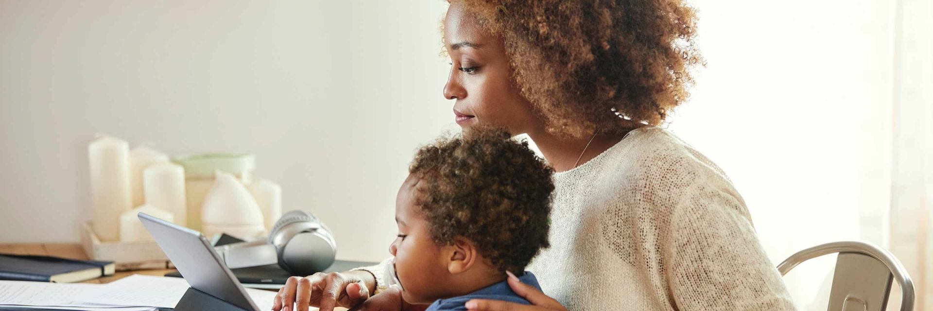  mother son reading Barclays